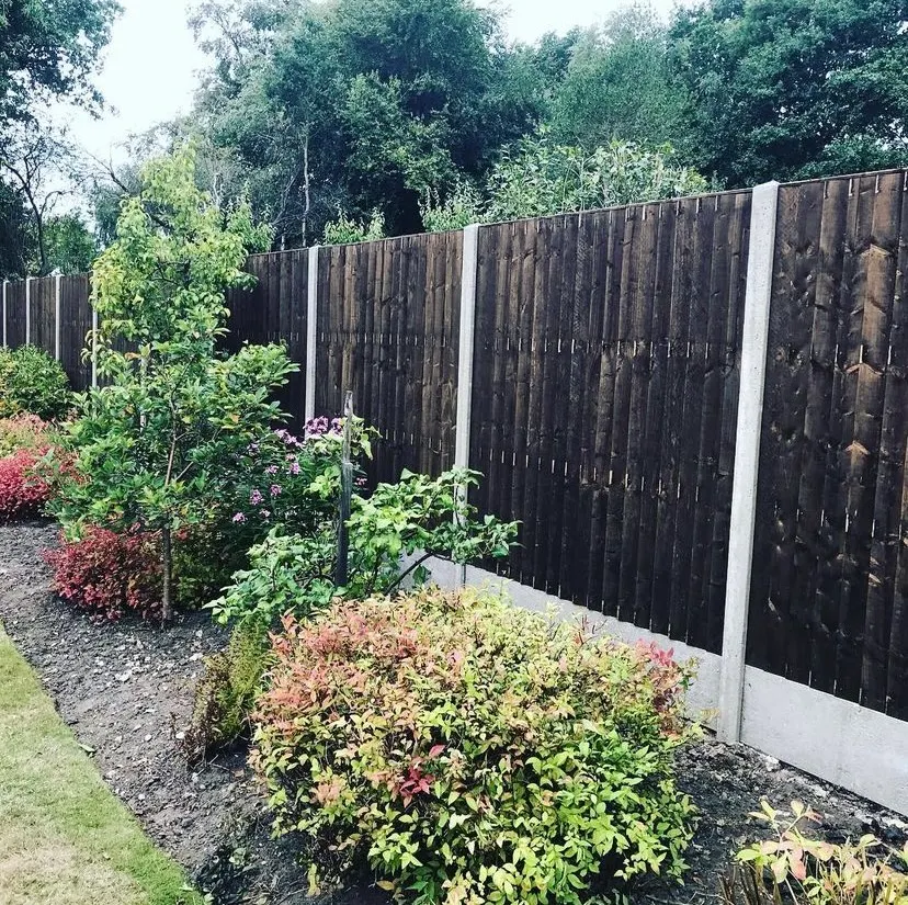 Replacement fence panel fitted into an existing fence run
